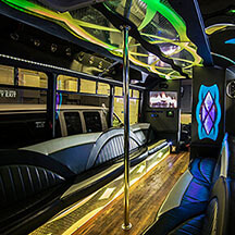 Seattle party limo bus with dance poles and colorful LED lghts